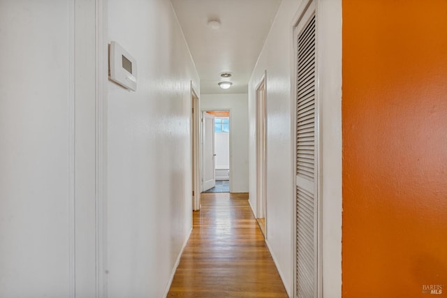 hallway featuring hardwood / wood-style floors