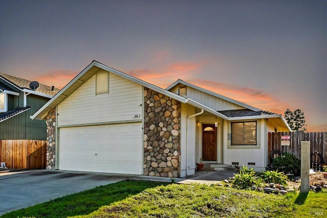 view of front of property featuring a garage