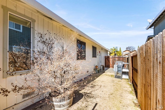 view of side of home with cooling unit