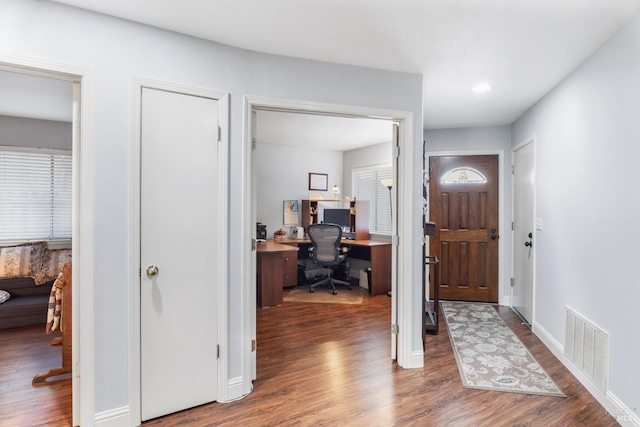 foyer featuring dark hardwood / wood-style floors