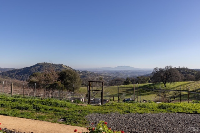 view of mountain feature with a rural view