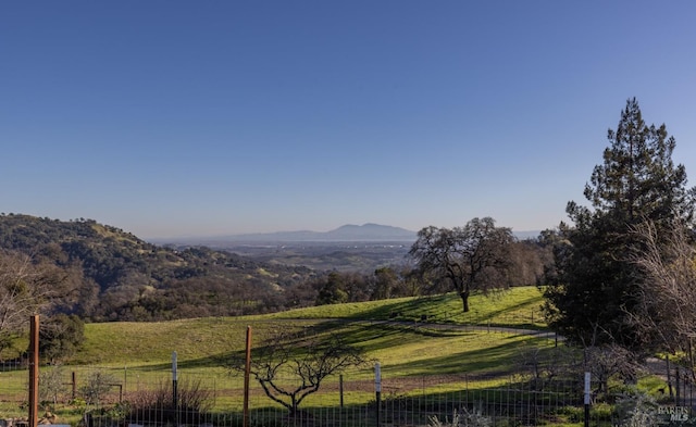 property view of mountains featuring a rural view