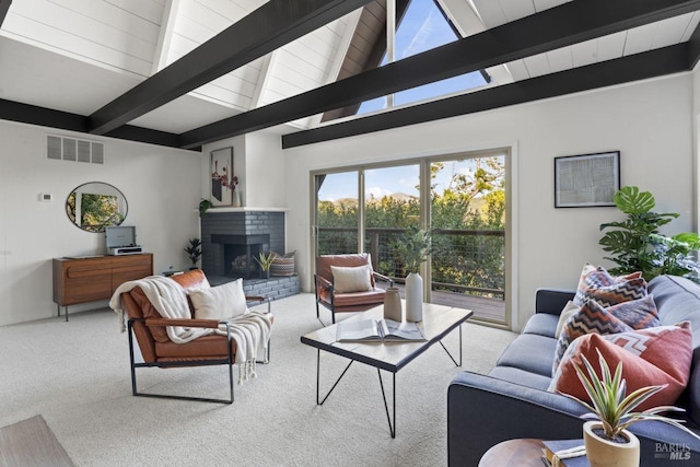 living room with carpet flooring, beam ceiling, high vaulted ceiling, and a brick fireplace