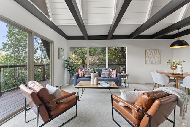 living room with beam ceiling