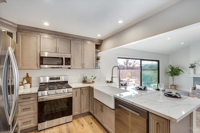 1779 Monarch Dr, Napa, CA 94558 - kitchen with appliances with stainless steel finishes, kitchen peninsula, and sink