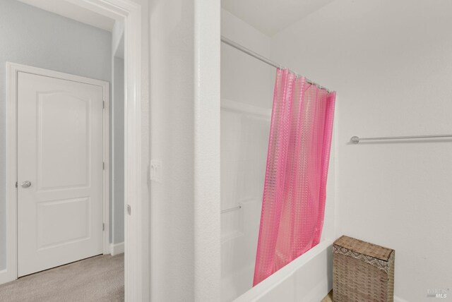 bathroom with curtained shower