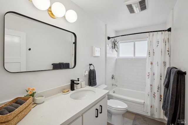 full bathroom with vanity, shower / bath combination with curtain, and toilet