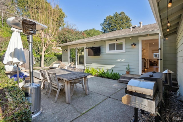 view of patio featuring a grill