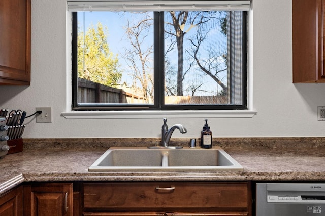 kitchen featuring sink and stainless steel dishwasher