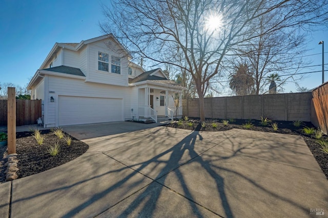 view of front of home with a garage