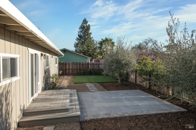 view of yard with a patio area and a fenced backyard