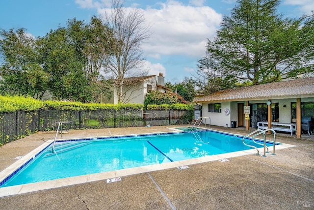 view of pool with a patio area