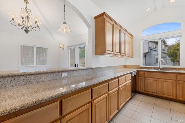 kitchen featuring vaulted ceiling with beams, sink, pendant lighting, and light stone counters