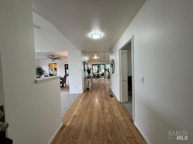 hallway featuring light wood-type flooring