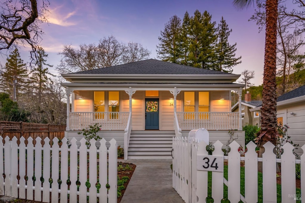 bungalow featuring covered porch