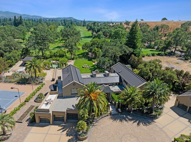 birds eye view of property featuring a mountain view