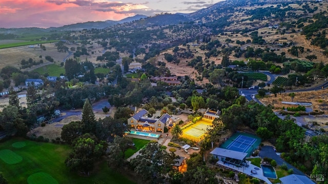 view of aerial view at dusk