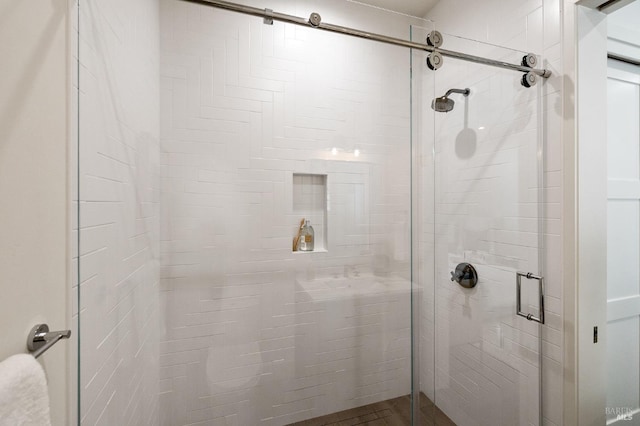 bathroom with an enclosed shower