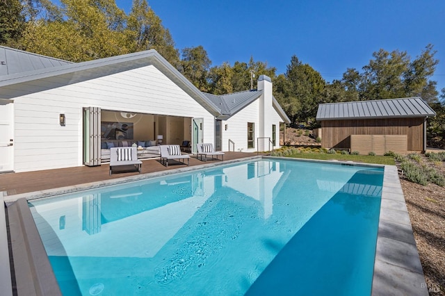 view of pool featuring an outdoor structure