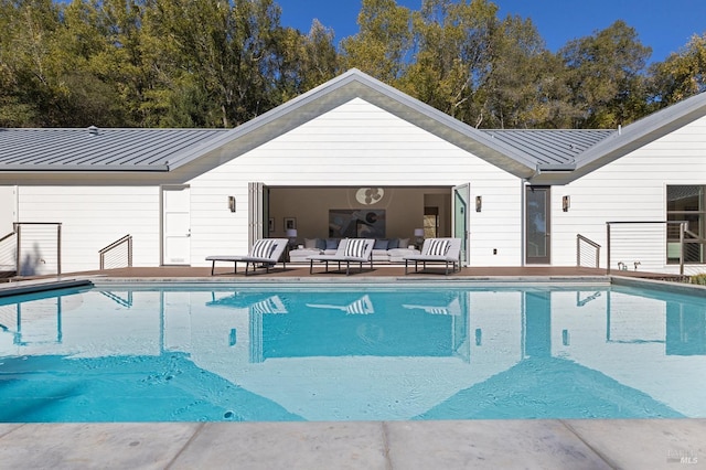 view of pool with an outdoor hangout area