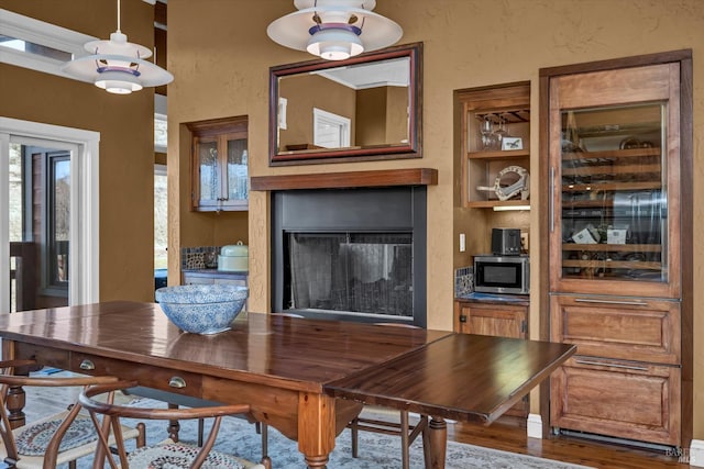 dining room with hardwood / wood-style flooring