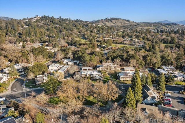 birds eye view of property featuring a mountain view