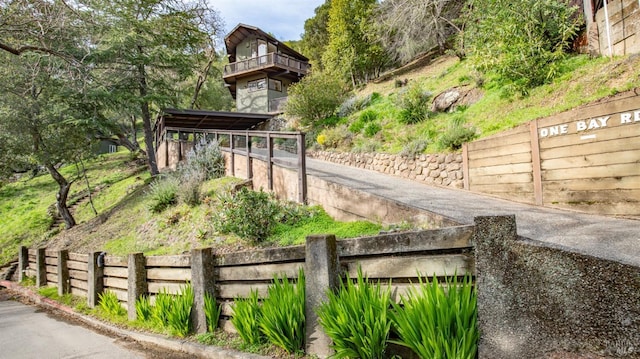 view of property's community with fence