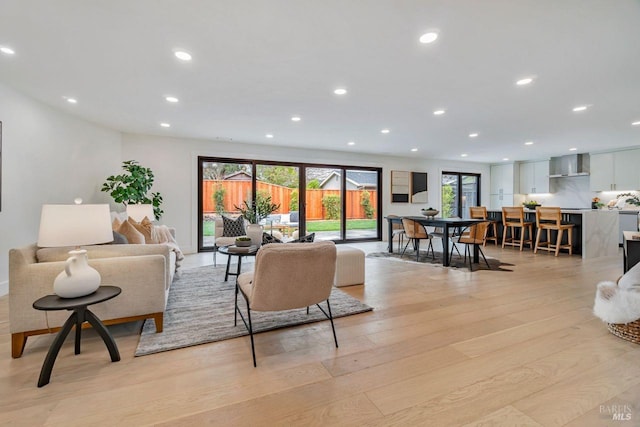 living room with light hardwood / wood-style floors