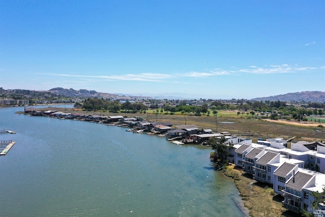 bird's eye view featuring a water and mountain view