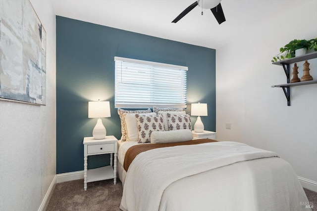 carpeted bedroom featuring ceiling fan