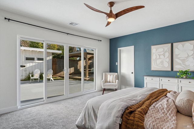 carpeted bedroom featuring access to outside and ceiling fan