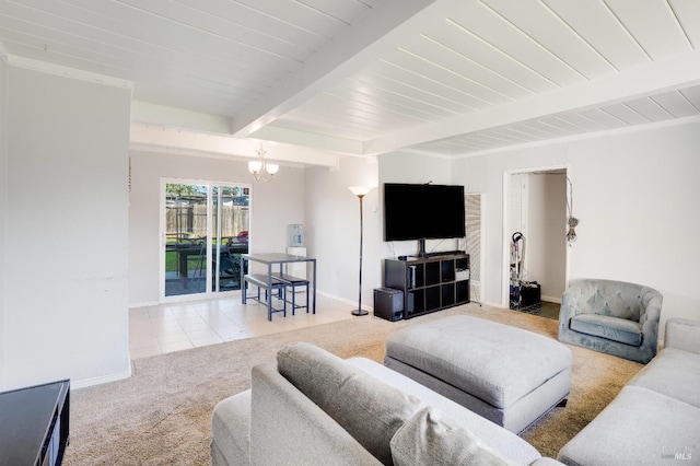 living room featuring carpet floors, a chandelier, and beamed ceiling