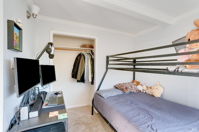 carpeted bedroom featuring beamed ceiling, ornamental molding, and a closet