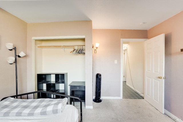 carpeted bedroom featuring a closet