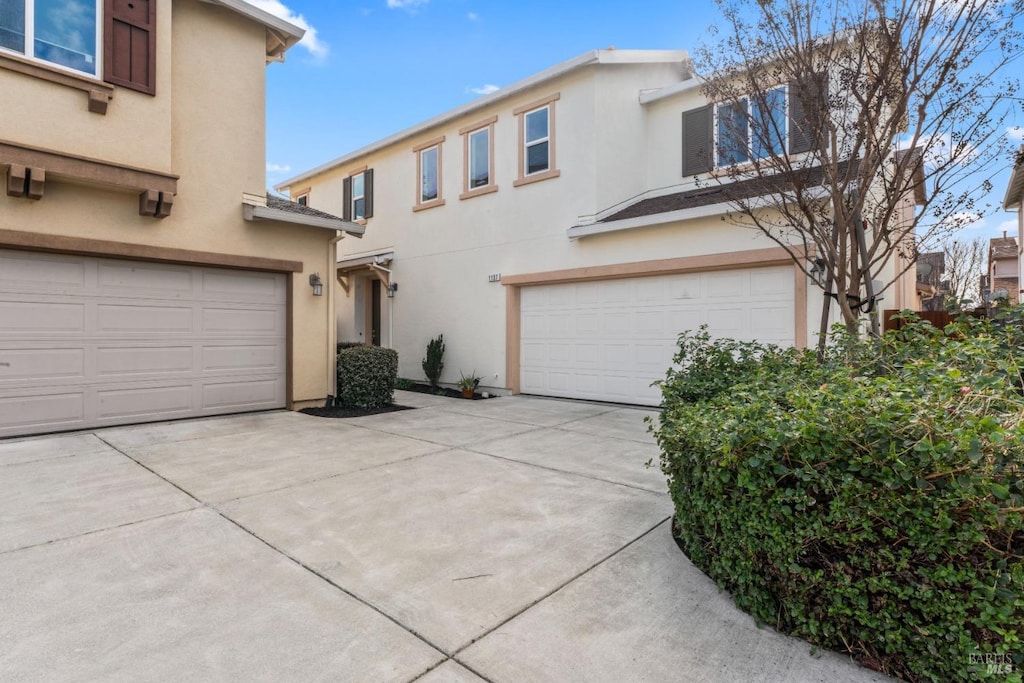 exterior space with a garage