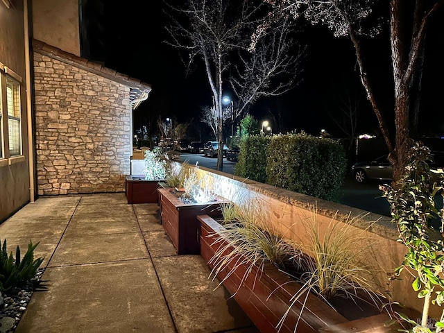 view of patio at night