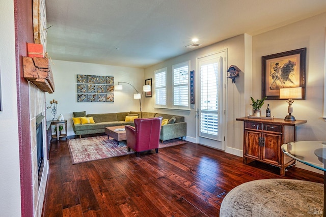 living room with dark wood-type flooring