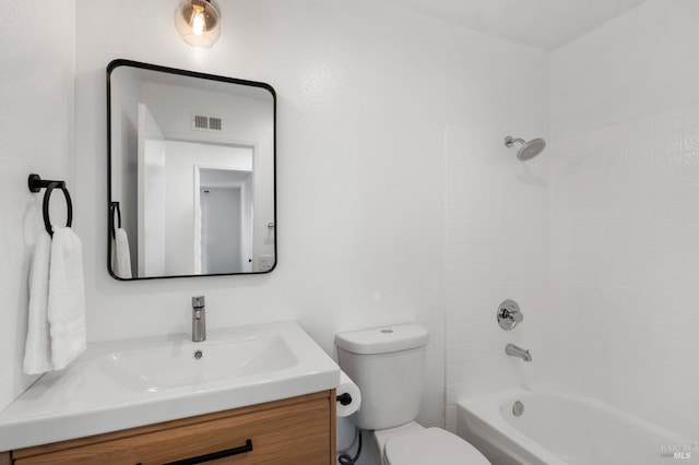 full bathroom with vanity, toilet, and washtub / shower combination