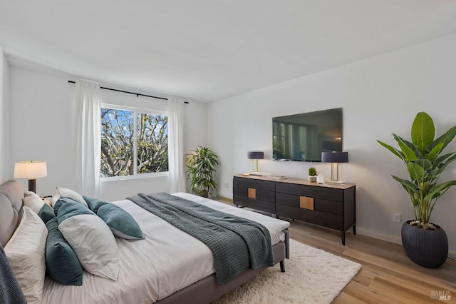 bedroom featuring light hardwood / wood-style flooring