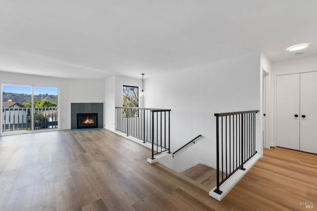 stairway featuring hardwood / wood-style flooring