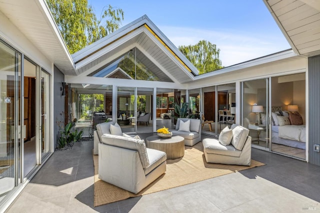 sunroom / solarium with lofted ceiling