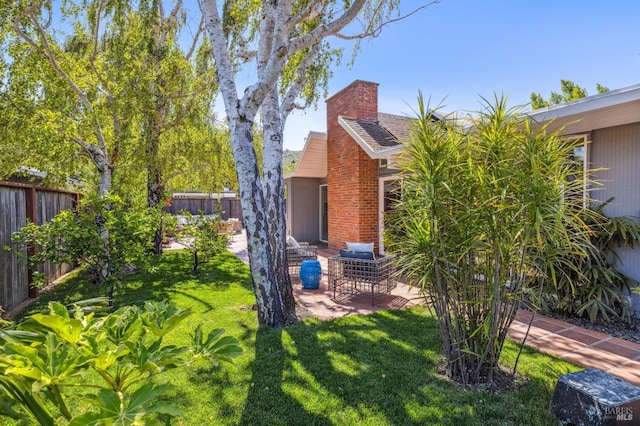 view of yard featuring a fenced backyard and a patio