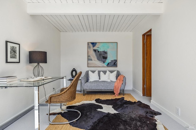 office featuring beam ceiling and baseboards