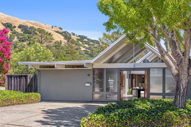 view of front facade featuring a mountain view