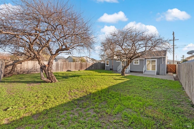 view of yard with a patio and an outdoor structure