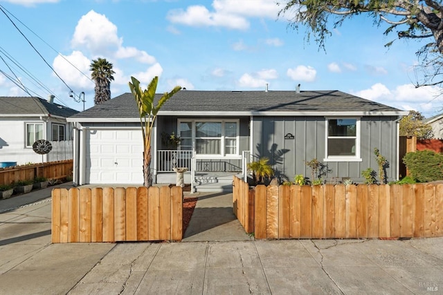 view of front of home featuring a garage and covered porch