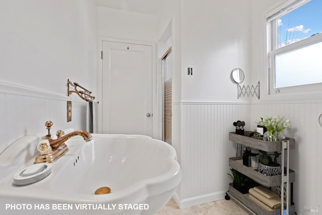 bathroom featuring sink and a bathtub