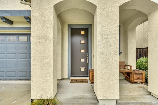 entrance to property with a garage