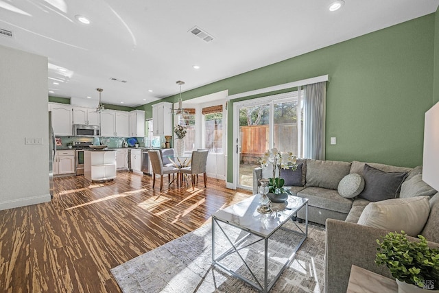 living room with wood-type flooring