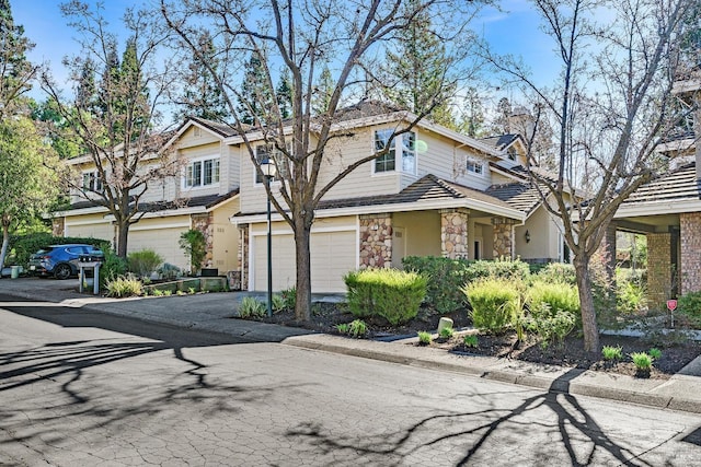 front of property with a garage